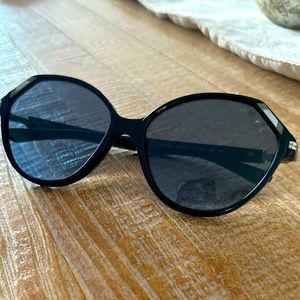Black Tory Burch sunglasses with grey blue Gradient lenses